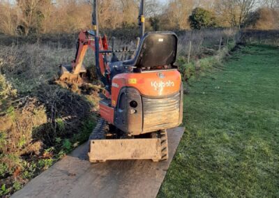 The Mini Digger Guy clearing an allotment