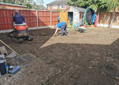 Digging gardens using a mini digger and driver hire service
