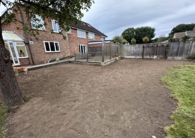 A garden after bamboo removal using a mini digger and driver hire service by The Mini Digger Guy