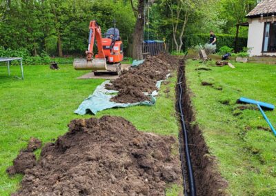 During a trench dig for a cable installation using a mini digger and driver hire service by The Mini Digger Guy